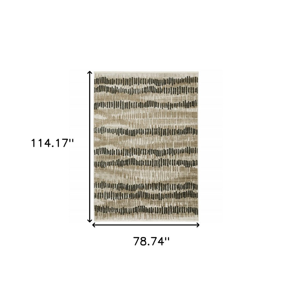 6' X 9' Beige Ivory Charcoal Brown Tan And Grey Abstract Power Loom Stain Resistant Area Rug With Fringe
