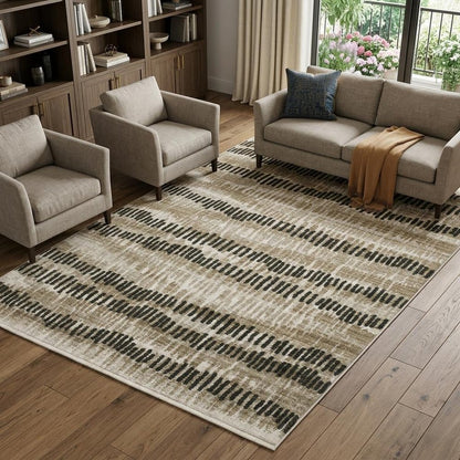 6' X 9' Beige Ivory Charcoal Brown Tan And Grey Abstract Power Loom Stain Resistant Area Rug With Fringe
