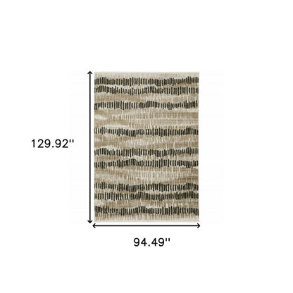 8' X 11' Beige Ivory Charcoal Brown Tan And Grey Abstract Power Loom Stain Resistant Area Rug With Fringe