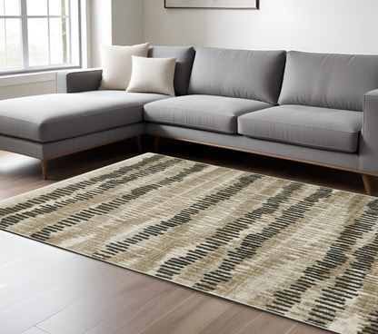 8' X 11' Beige Ivory Charcoal Brown Tan And Grey Abstract Power Loom Stain Resistant Area Rug With Fringe