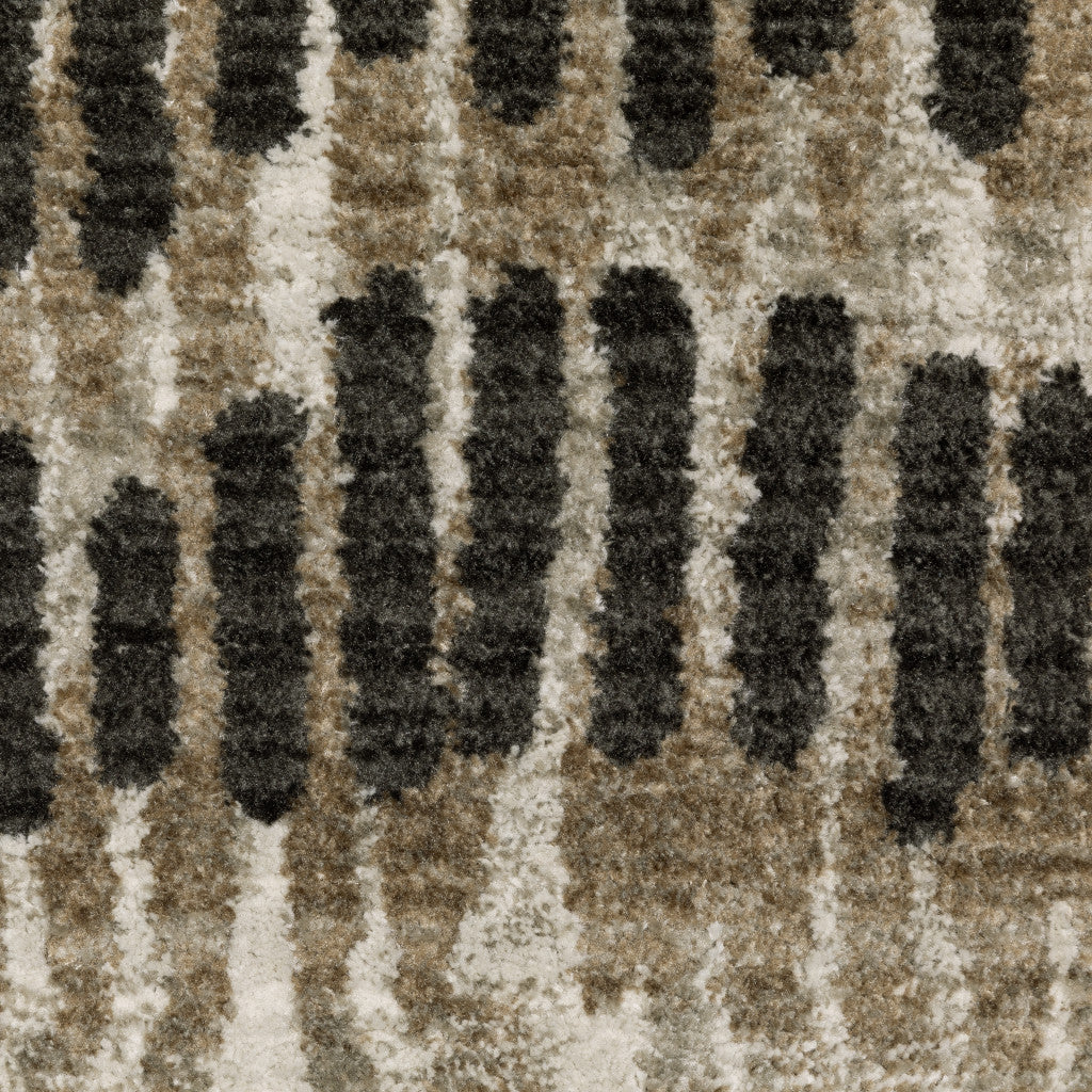 8' X 11' Beige Ivory Charcoal Brown Tan And Grey Abstract Power Loom Stain Resistant Area Rug With Fringe