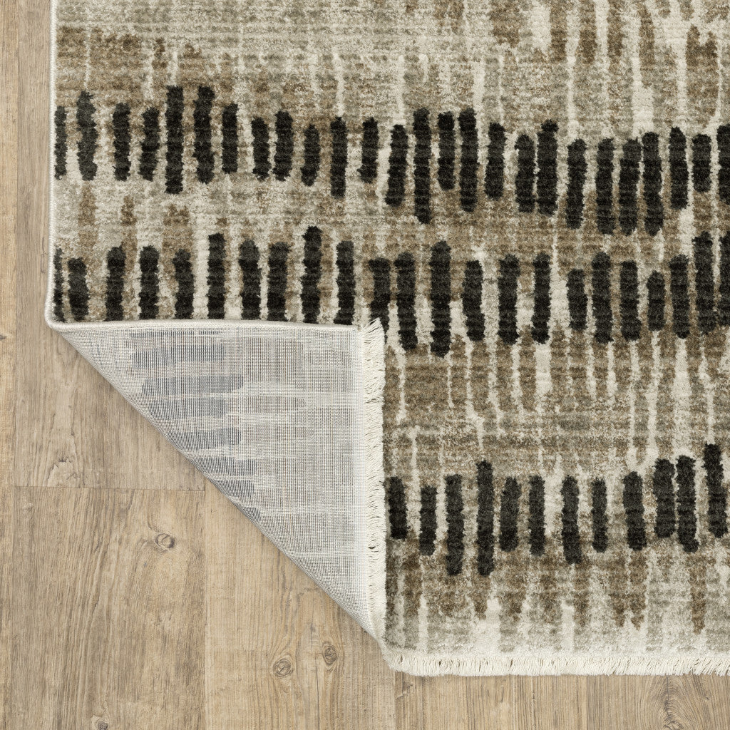 8' X 11' Beige Ivory Charcoal Brown Tan And Grey Abstract Power Loom Stain Resistant Area Rug With Fringe