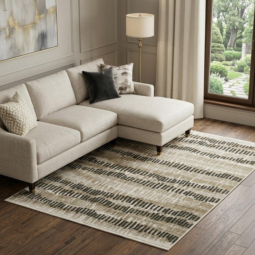 10' X 13' Beige Ivory Charcoal Brown Tan And Grey Abstract Power Loom Stain Resistant Area Rug With Fringe