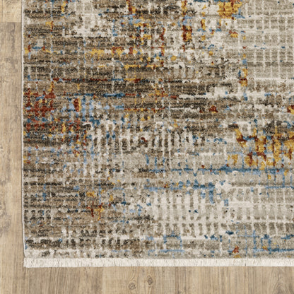 5' X 8' Beige Grey Brown Gold Red And Blue Abstract Power Loom Stain Resistant Area Rug With Fringe