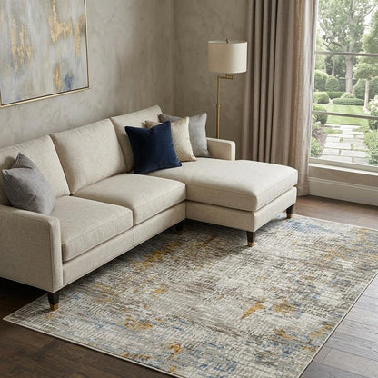 10' X 13' Beige Grey Brown Gold Red And Blue Abstract Power Loom Stain Resistant Area Rug With Fringe