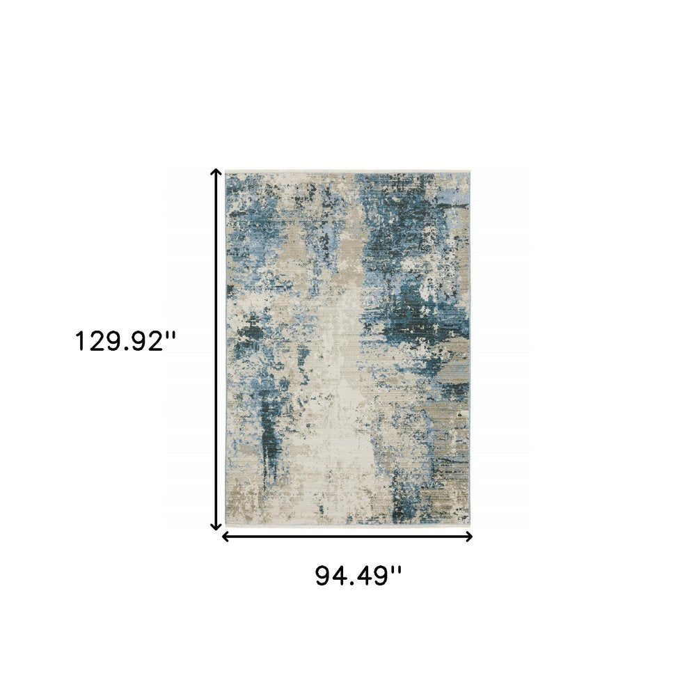 8' X 11' Blue Grey Ivory Light Blue And Dark Blue Abstract Power Loom Stain Resistant Area Rug With Fringe