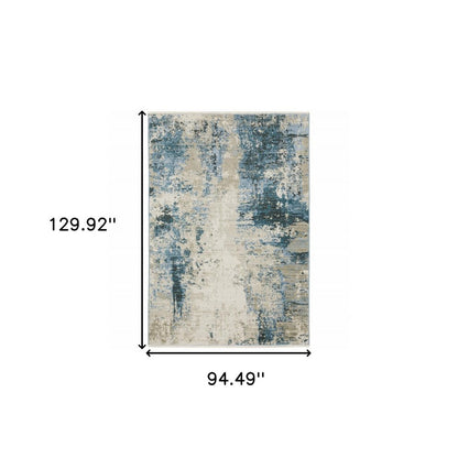 8' X 11' Blue Grey Ivory Light Blue And Dark Blue Abstract Power Loom Stain Resistant Area Rug With Fringe