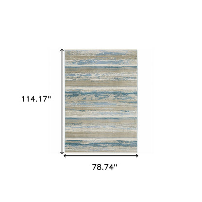 6' X 9' Ivory Beige Grey Blue And Tan Abstract Power Loom Stain Resistant Area Rug With Fringe