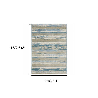 10' X 13' Ivory Beige Grey Blue And Tan Abstract Power Loom Stain Resistant Area Rug With Fringe