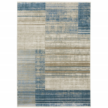 4' X 6' Blue Dark Blue Teal Grey Ivory Beige And Tan Geometric Power Loom Stain Resistant Area Rug With Fringe