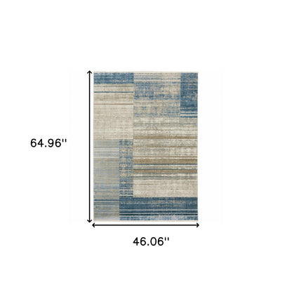 4' X 6' Blue Dark Blue Teal Grey Ivory Beige And Tan Geometric Power Loom Stain Resistant Area Rug With Fringe