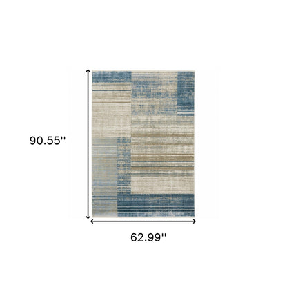 5' X 8' Blue Dark Blue Teal Grey Ivory Beige And Tan Geometric Power Loom Stain Resistant Area Rug With Fringe