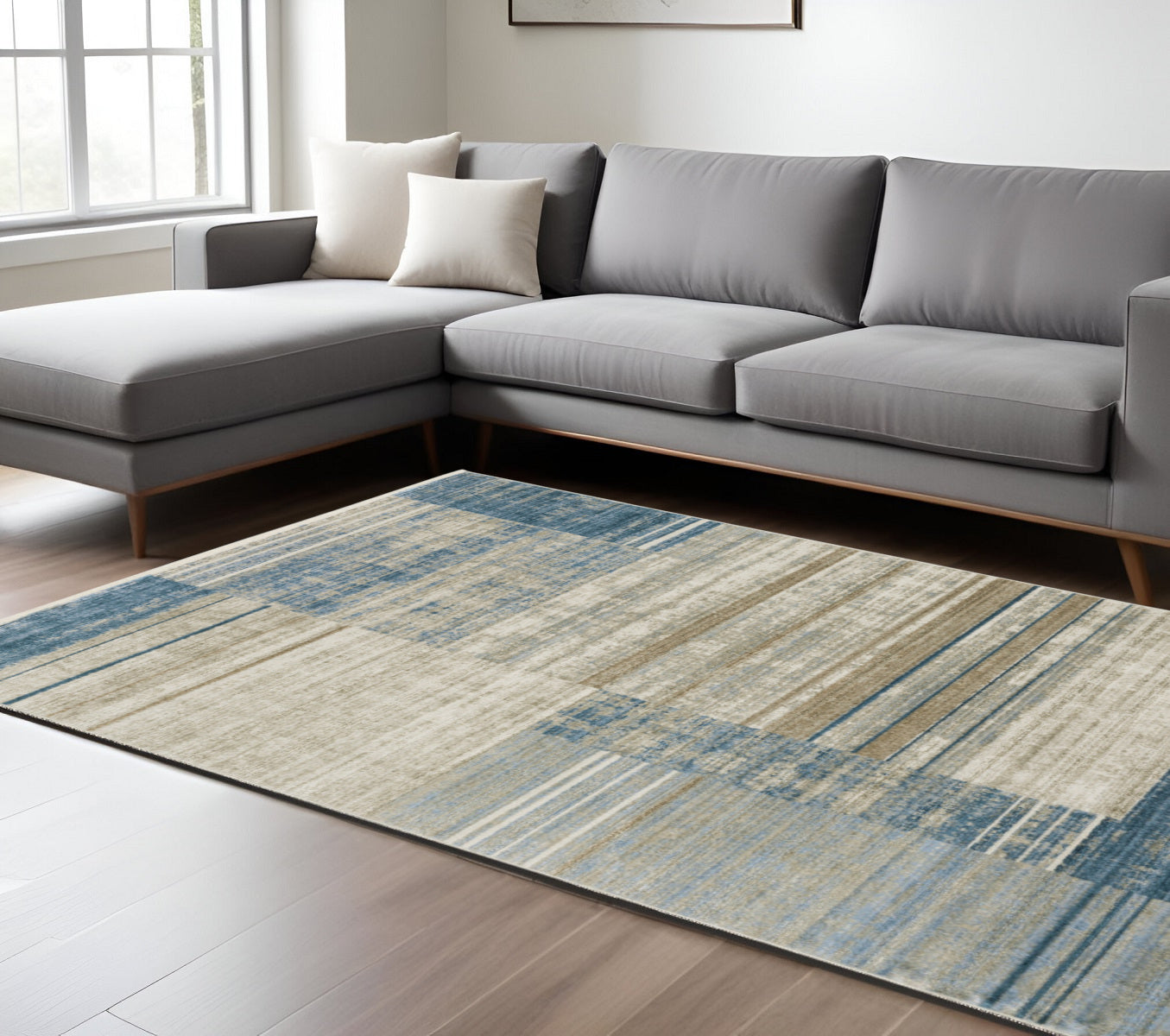 8' X 11' Blue Dark Blue Teal Grey Ivory Beige And Tan Geometric Power Loom Stain Resistant Area Rug With Fringe