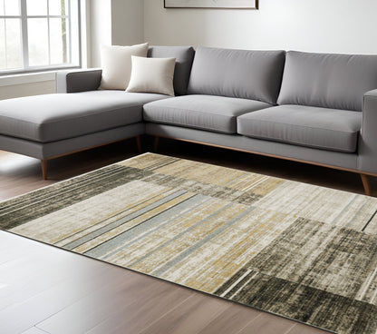 8' X 11' Beige Charcoal Brown Grey Tan Gold And Blue Geometric Power Loom Stain Resistant Area Rug With Fringe