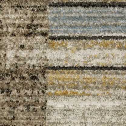 8' X 11' Beige Charcoal Brown Grey Tan Gold And Blue Geometric Power Loom Stain Resistant Area Rug With Fringe