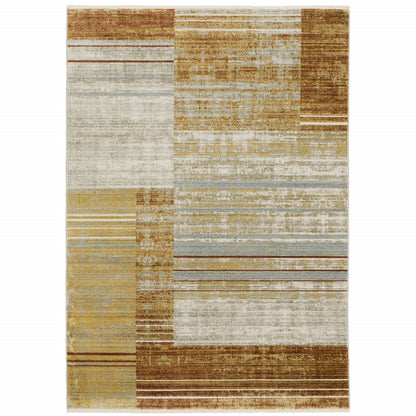 6' X 9' Rust Gold Blue Grey Ivory And Tan Geometric Power Loom Stain Resistant Area Rug With Fringe