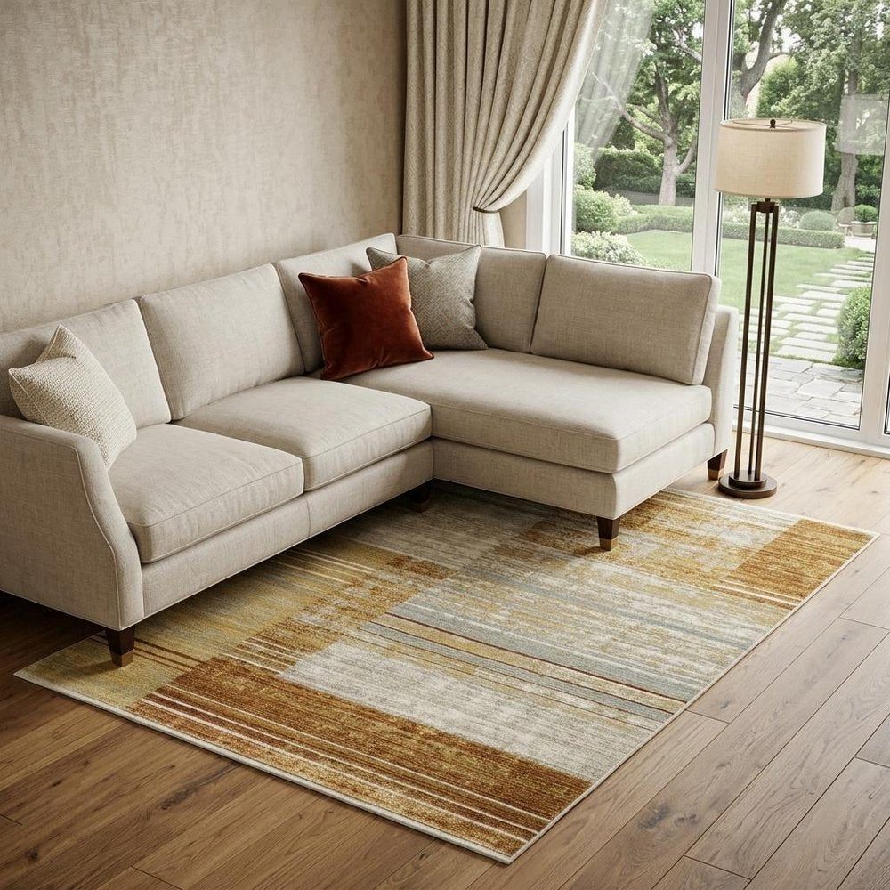 8' X 11' Rust Gold Blue Grey Ivory And Tan Geometric Power Loom Stain Resistant Area Rug With Fringe