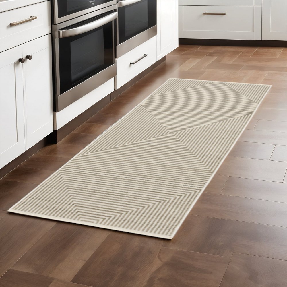 8' Ivory Beige Taupe And Tan Geometric Power Loom Runner Rug With Fringe