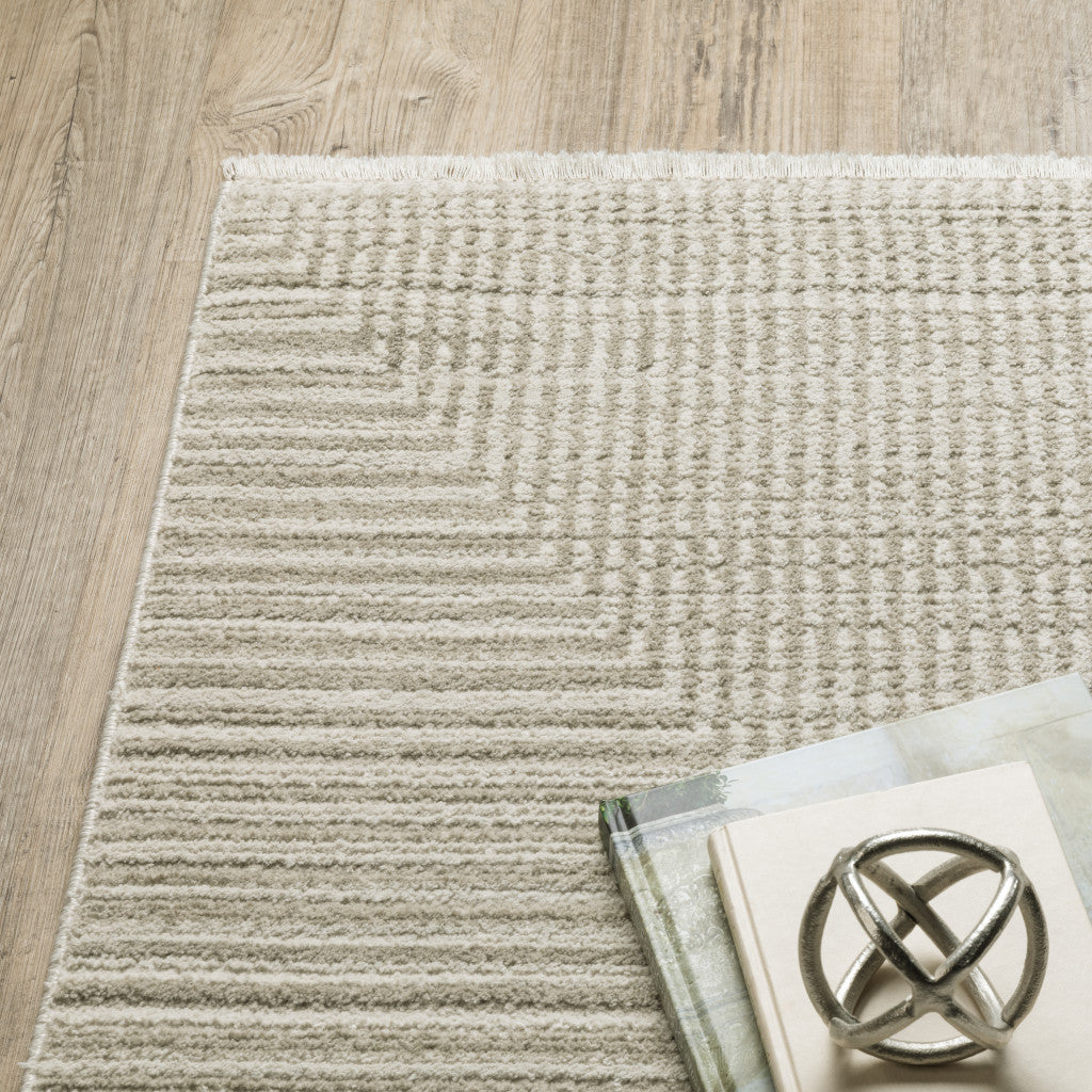 8' Ivory Beige Taupe And Tan Geometric Power Loom Runner Rug With Fringe