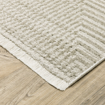 6' X 9' Beige and Ivory Geometric Power Loom Area Rug