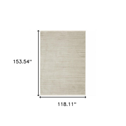 10' X 13' Ivory Beige Taupe And Tan Geometric Power Loom Stain Resistant Area Rug With Fringe