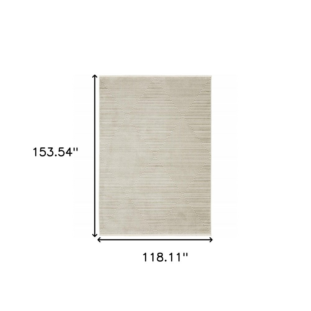 10' X 13' Ivory Beige Taupe And Tan Geometric Power Loom Stain Resistant Area Rug With Fringe