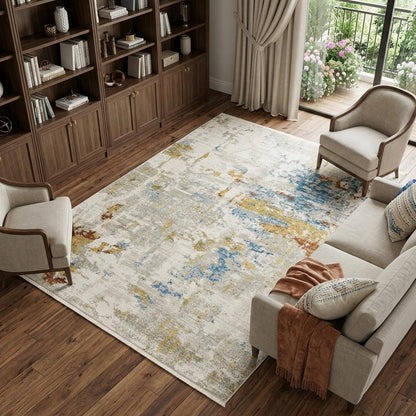 6' X 9' Beige Grey Gold Blue Rust And Teal Abstract Power Loom Stain Resistant Area Rug With Fringe