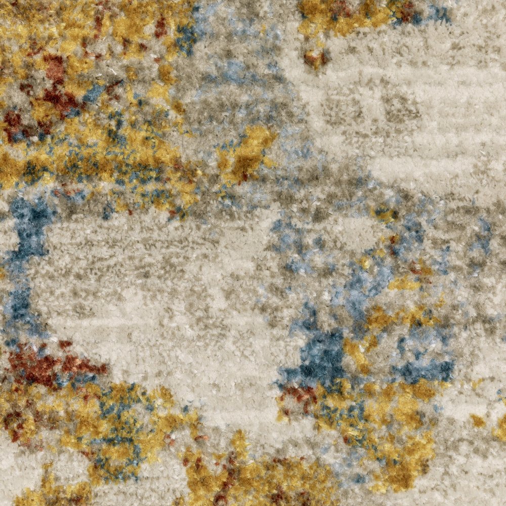 6' X 9' Beige Grey Gold Blue Rust And Teal Abstract Power Loom Stain Resistant Area Rug With Fringe