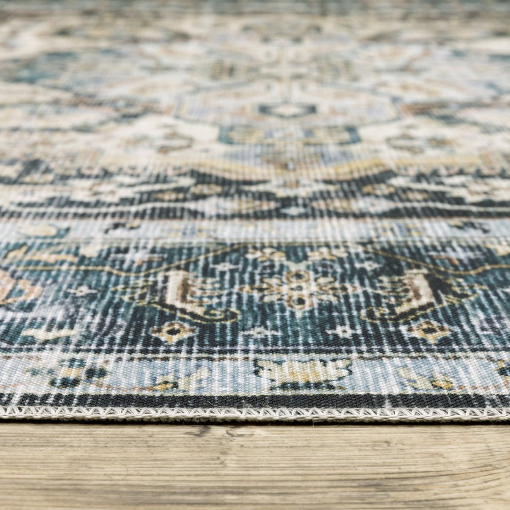4' X 6' Blue Ivory Teal Brown And Gold Oriental Printed Stain Resistant Non Skid Area Rug