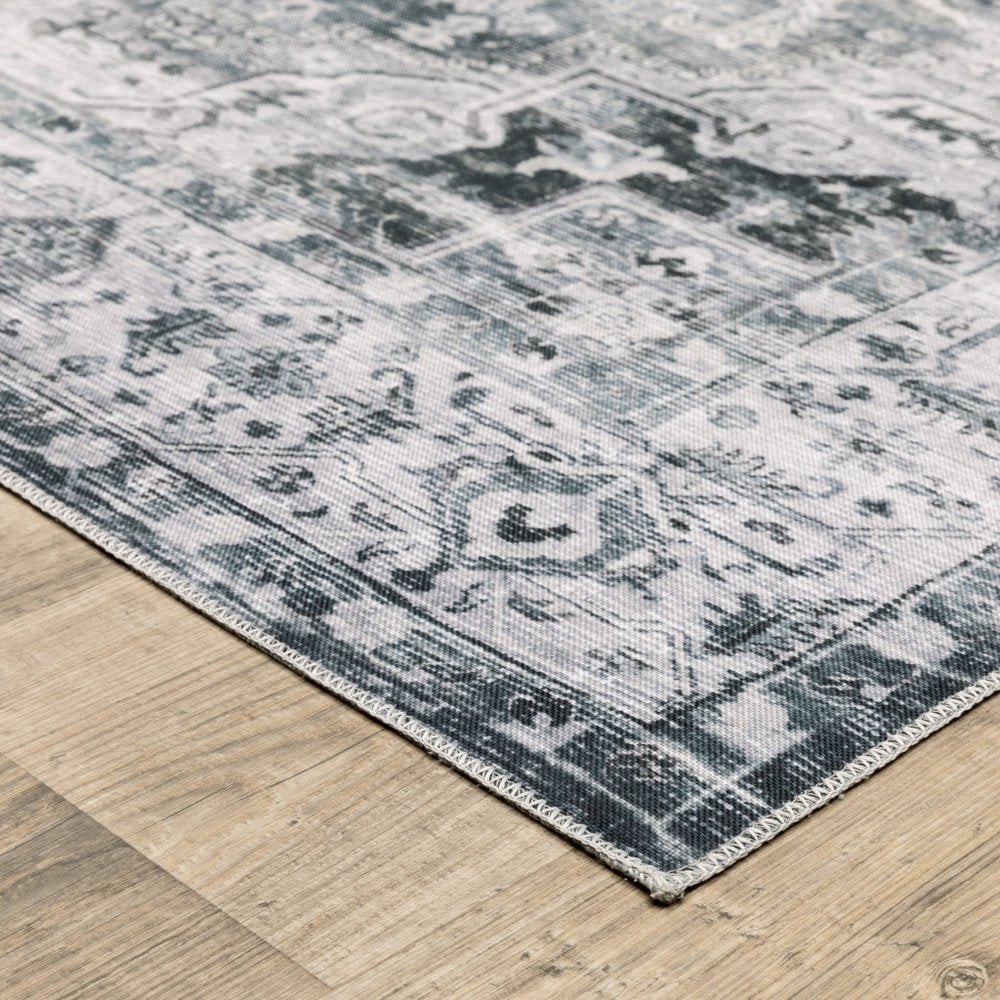 4' X 6' Navy Blue Ivory And Grey Oriental Printed Stain Resistant Non Skid Area Rug