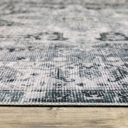 4' X 6' Navy Blue Ivory And Grey Oriental Printed Stain Resistant Non Skid Area Rug