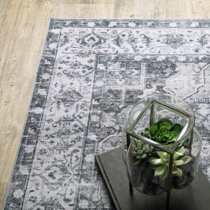 4' X 6' Navy Blue Ivory And Grey Oriental Printed Stain Resistant Non Skid Area Rug