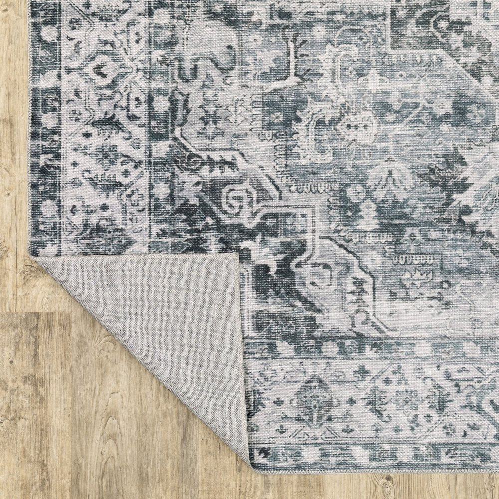 4' X 6' Navy Blue Ivory And Grey Oriental Printed Stain Resistant Non Skid Area Rug
