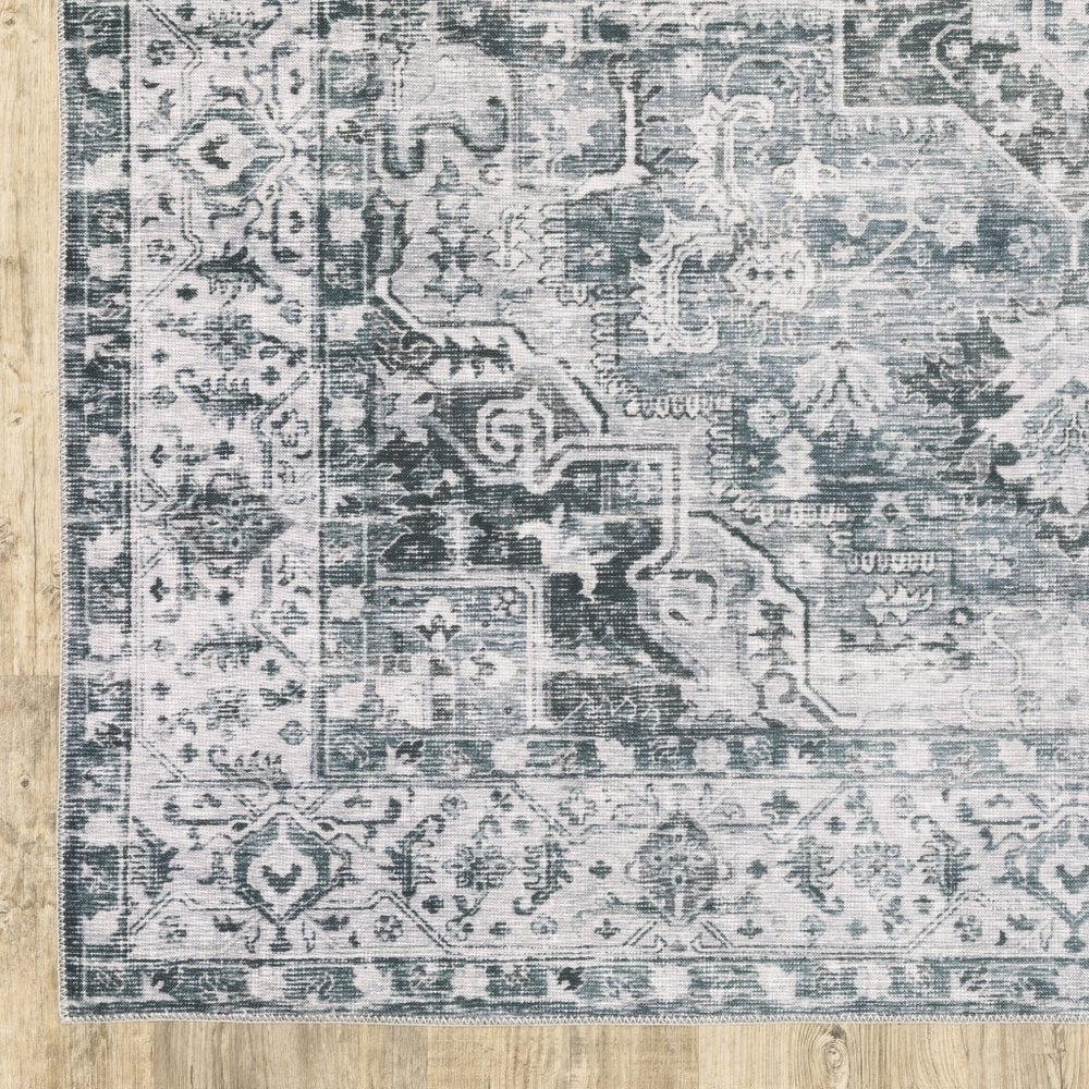 4' X 6' Navy Blue Ivory And Grey Oriental Printed Stain Resistant Non Skid Area Rug