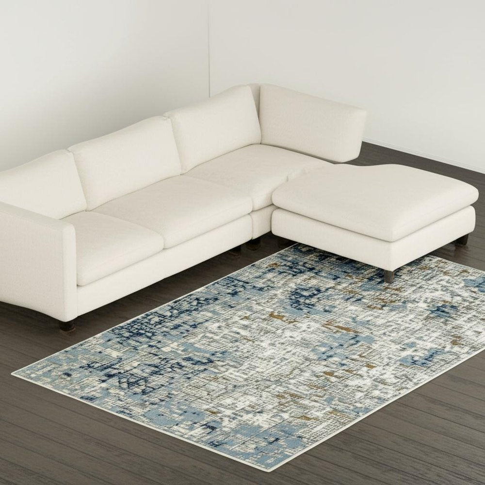 8' X 11' Blue Ivory Grey Brown Beige And Light Blue Abstract Power Loom Stain Resistant Area Rug