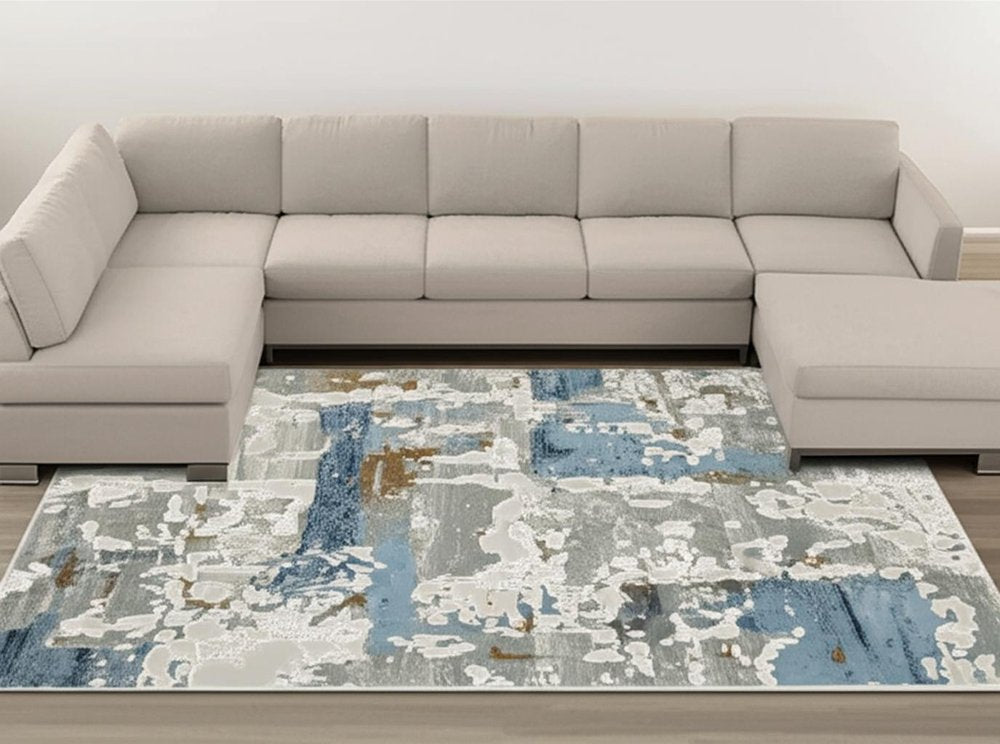 8' X 11' Grey Blue Navy Ivory And Brown Abstract Power Loom Stain Resistant Area Rug