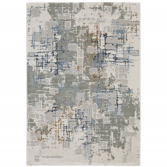 8' X 11' Grey Blue Brown Ivory And Deep Blue Abstract Power Loom Stain Resistant Area Rug