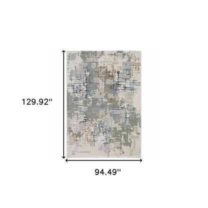 8' X 11' Grey Blue Brown Ivory And Deep Blue Abstract Power Loom Stain Resistant Area Rug