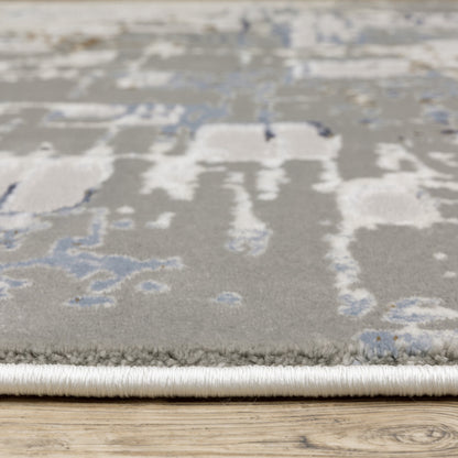 8' X 11' Grey Blue Brown Ivory And Deep Blue Abstract Power Loom Stain Resistant Area Rug