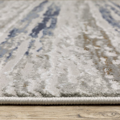 8' X 11' Blue Ivory Grey Light Blue And Brown Abstract Power Loom Stain Resistant Area Rug