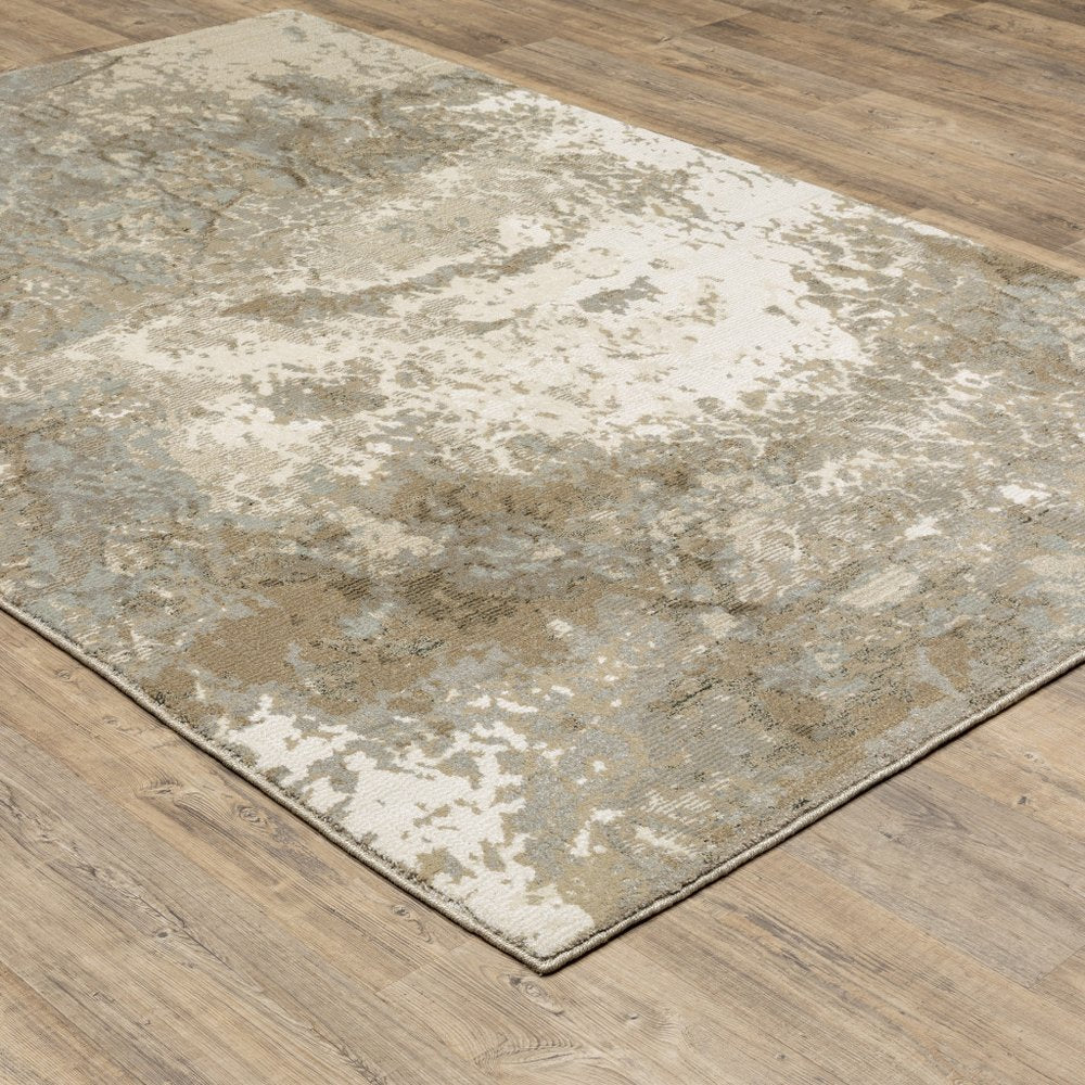 5' X 7' Gray and Ivory Abstract Power Loom Area Rug