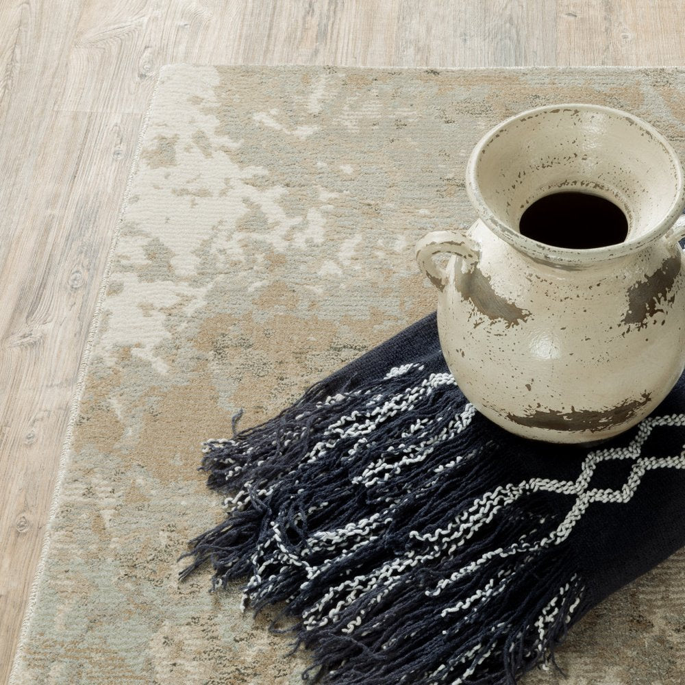 5' X 7' Gray and Ivory Abstract Power Loom Area Rug