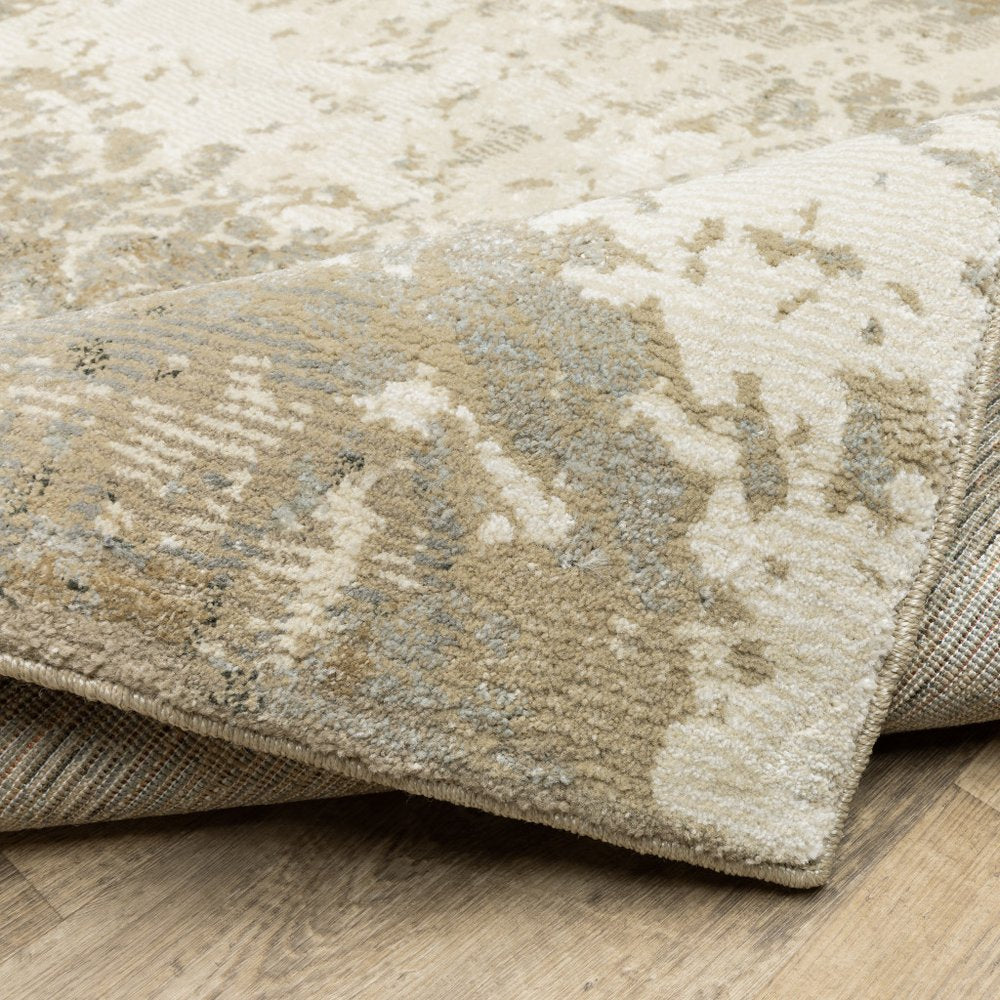5' X 7' Gray and Ivory Abstract Power Loom Area Rug