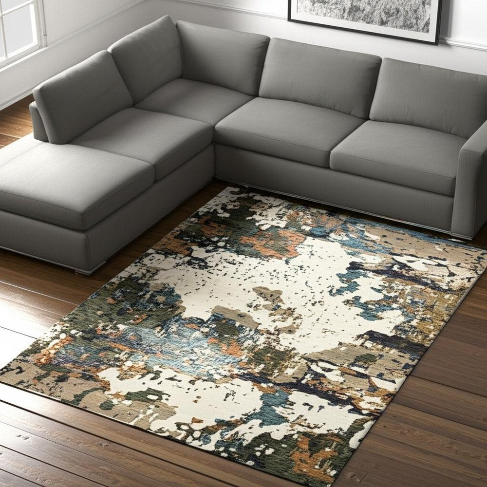 7' X 10' Blue and Ivory Abstract Power Loom Area Rug