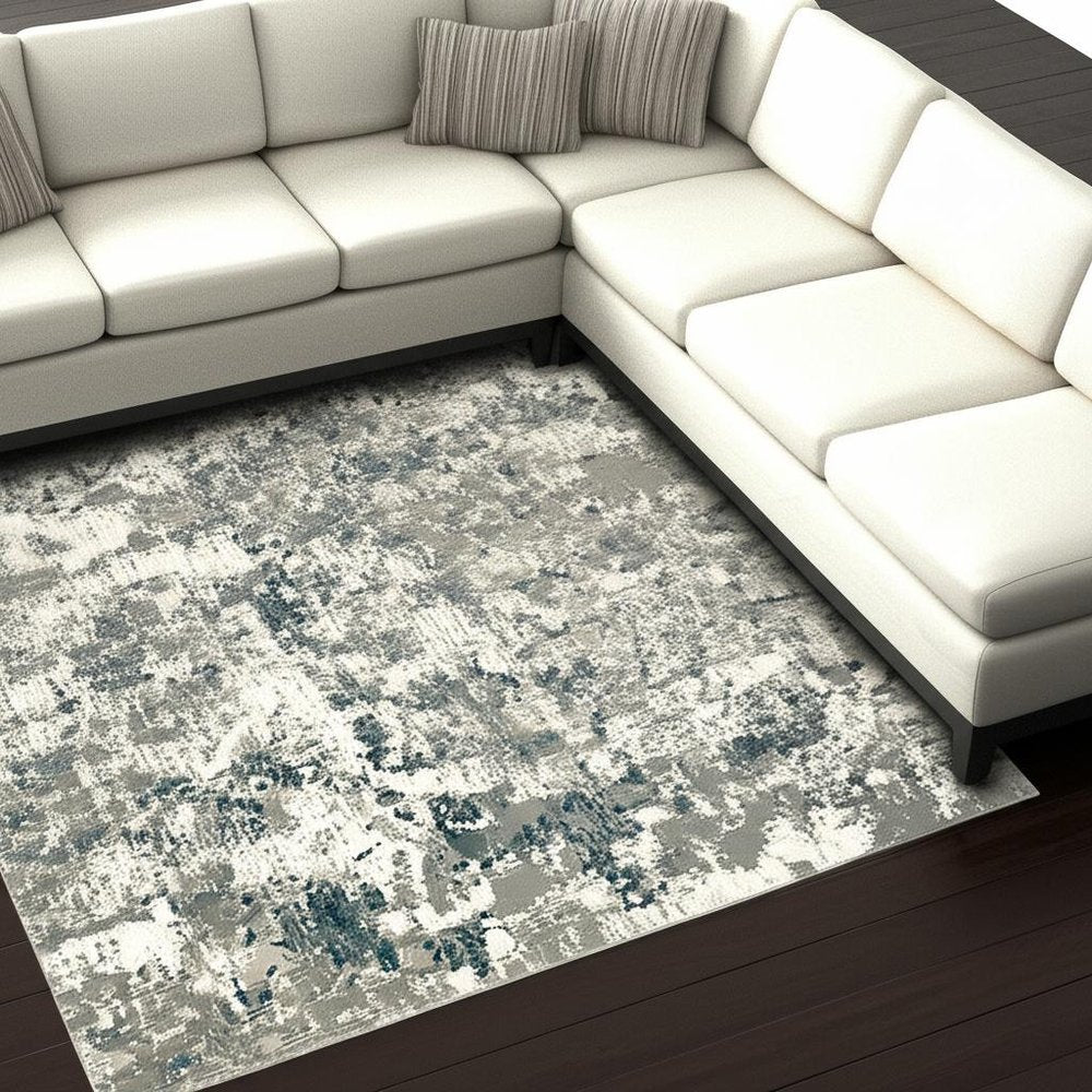 10' X 13' Blue and Beige Abstract Power Loom Area Rug