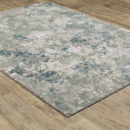 10' X 13' Blue and Beige Abstract Power Loom Area Rug