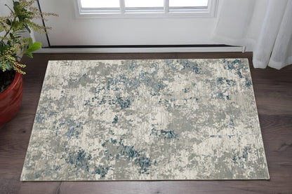 2' X 3' Blue and Beige Abstract Power Loom Area Rug