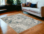 5' X 7' Blue and Beige Abstract Power Loom Area Rug