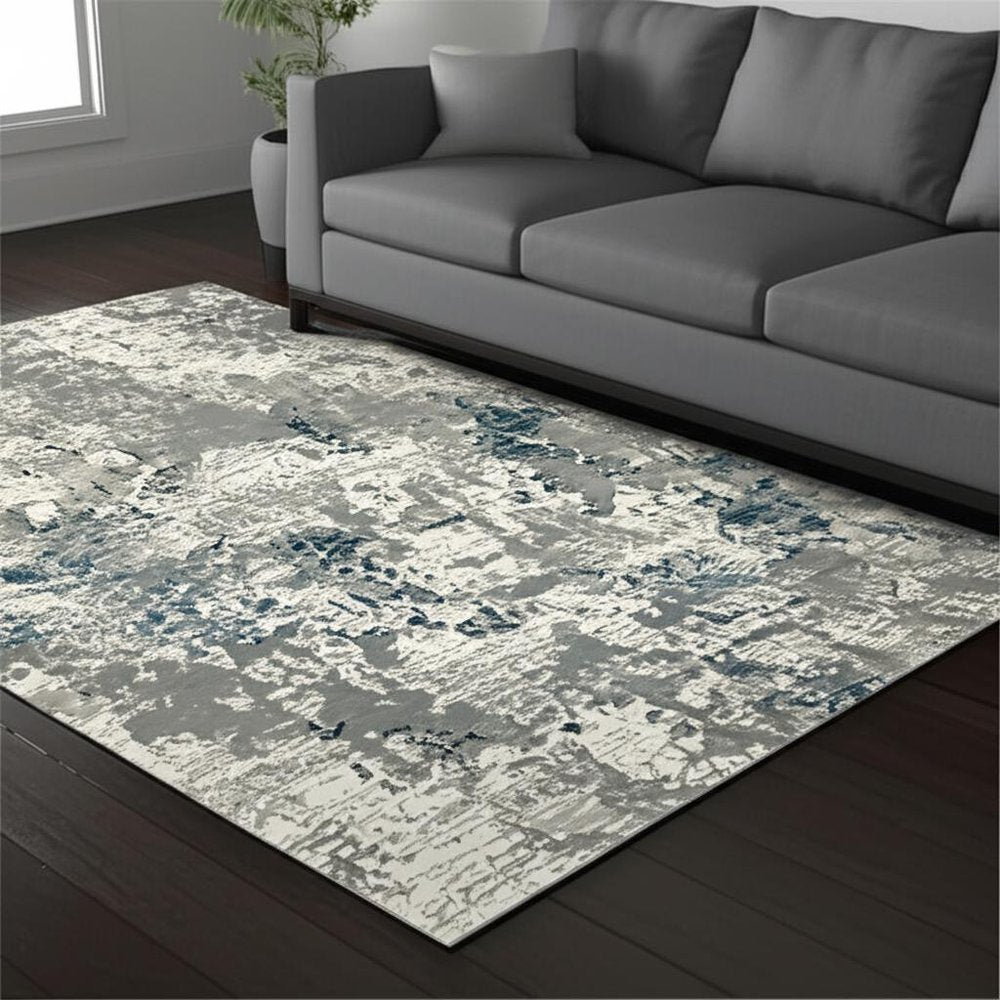 5' X 7' Blue and Beige Abstract Power Loom Area Rug