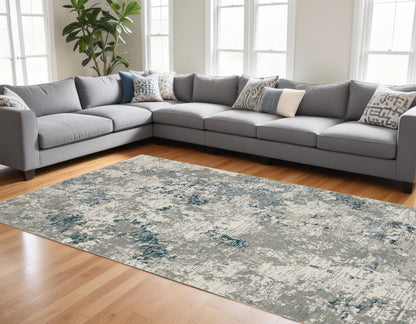 7' X 10' Blue and Beige Abstract Power Loom Area Rug